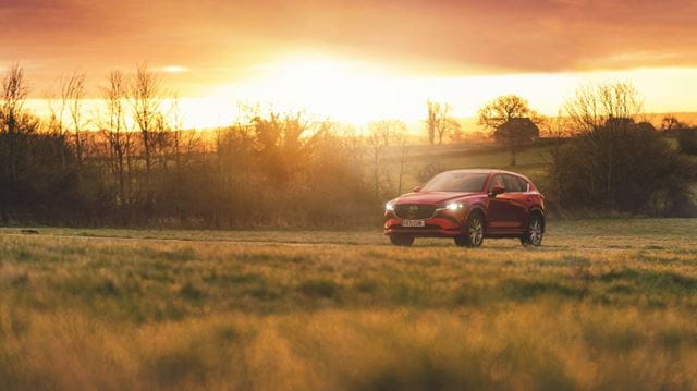 Mazda CX-5 in front of sunset